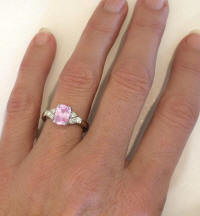 Pink Sapphire and Diamond Rings in 14k white gold on the Hand