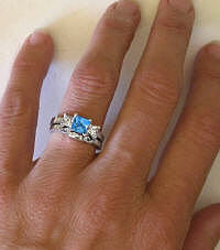 Princess Blue Topaz Engagement Rings in 14k White Gold