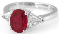 Three Stone Burmese Ruby and Trillion Diamond Ring in 18k white gold