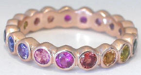 Bezel round natural rainbow sapphire eternity ring in platinum