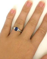 Emerald Cut Sapphire and Baguette Diamond Ring in 14k white gold on the hand