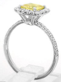 Cushion cut halo ring in gold