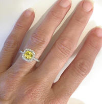 Cushion cut halo ring in gold