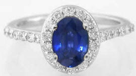 Natural Oval Blue Sapphire and Diamond Ring in 14k white gold for sale