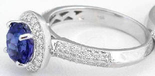 Tanzanite and Diamond Halo Engagement Ring in 14k white gold
