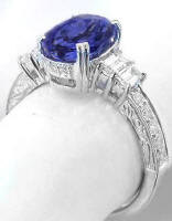 Natural Oval Tanzanite and Baguette Diamond Rings in 14k white gold