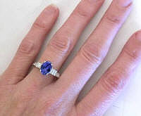 Tanzanite and Baguette Diamond Rings in 18k White Gold