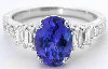 Oval Tanzanite and Baguette Diamond Ring in 18k white gold