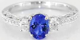 AAA Natural Tanzanite and Diamond Three Stone Ring in solid 14k white gold for sale