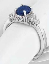 Oval cut natural blue sapphire band ring in 14k white gold